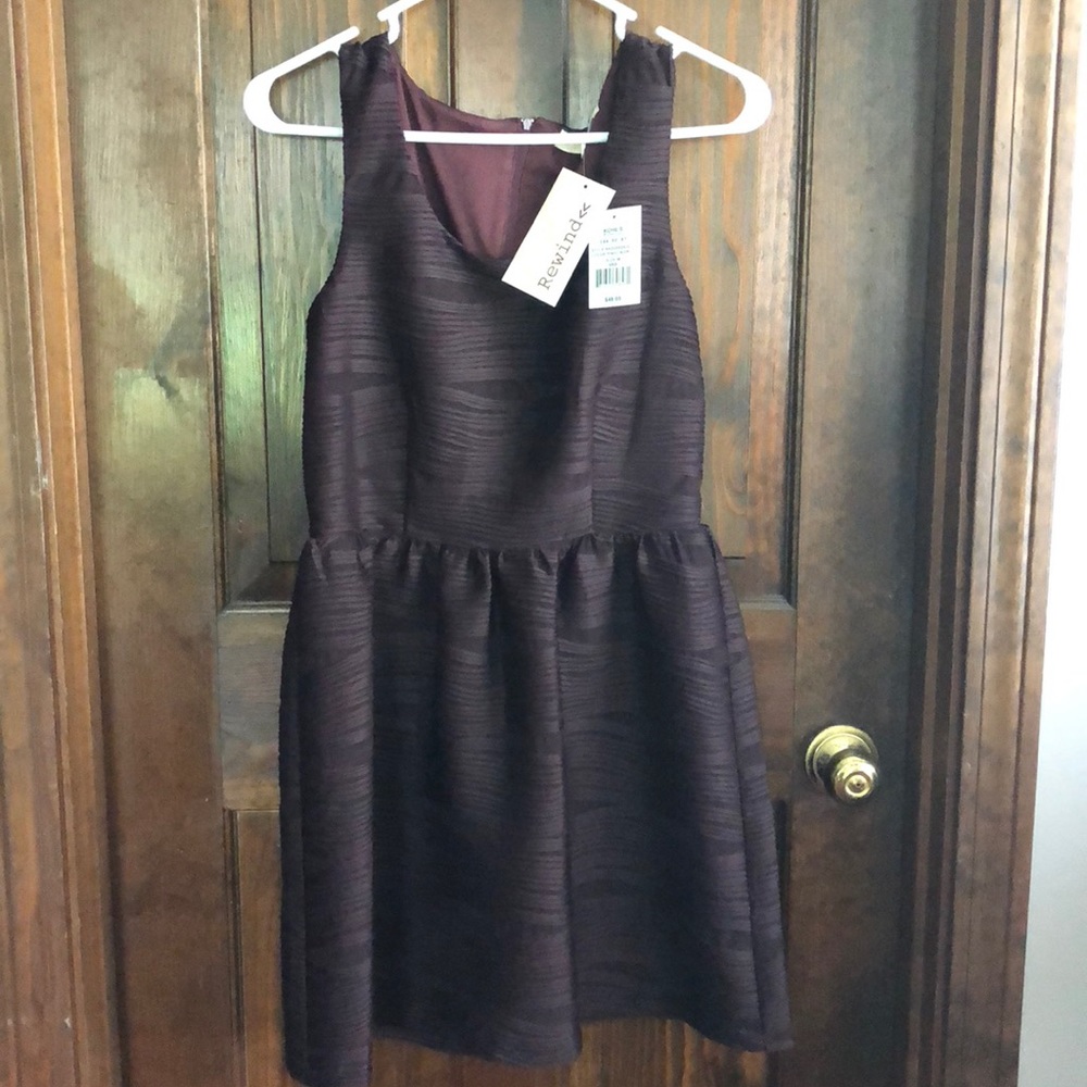Cute fully lined, flare bottom dress.